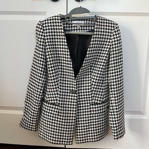 Brand new Calvin Klein blazer. Never actually worn. Brand new.